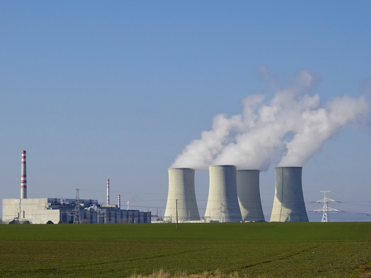 Cooling towers releasing water vapor at Jaslovské Bohunice Nuclear Power Plant in Slovakia